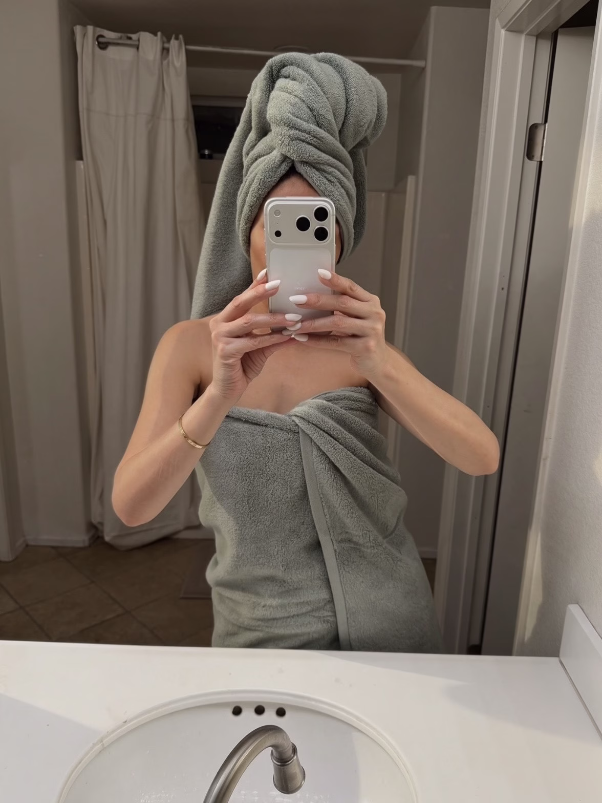 Organic sustainable products, woman wearing green towel